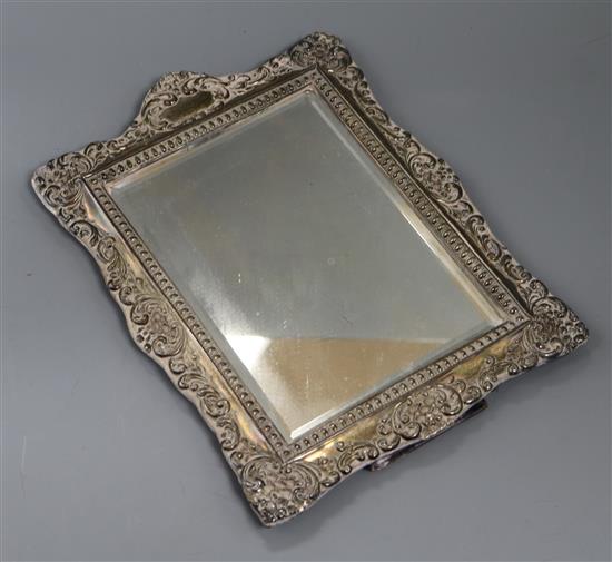 An Edwardian repousse silver mounted easel mirror, Henry Matthews, Birmingham, 1902, 30.2cm.